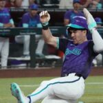 Diamondbacks rally in 7th, top Reds to keep pace in wild-card race