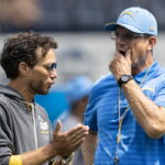 Jim Harbaugh: Mike McDaniel's job "is not in jeopardy"